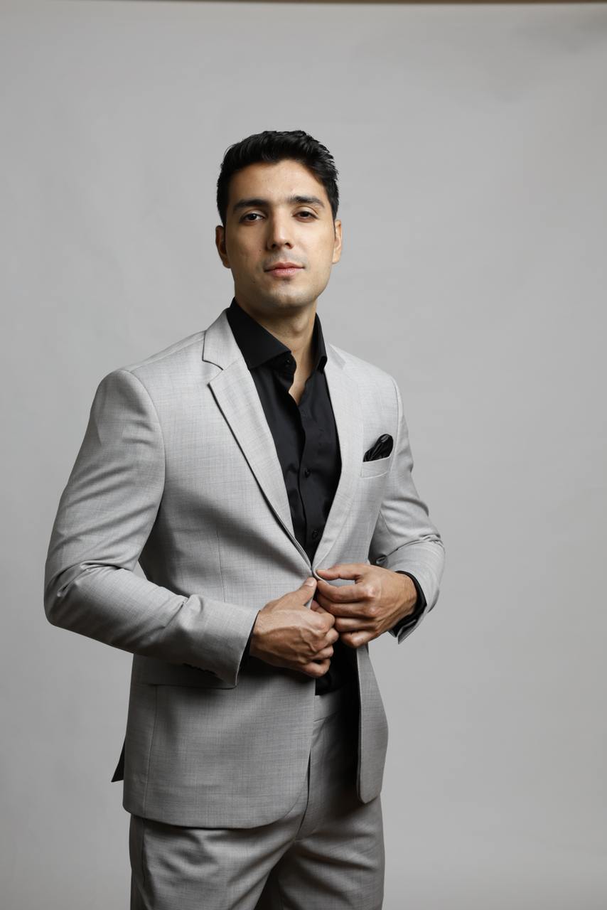 Light grey suit portrait with pocket square
